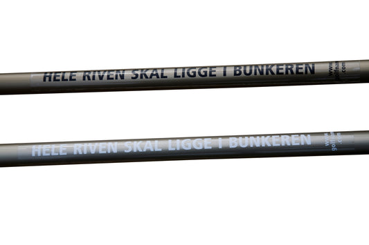 Sticker: "Place rake in the bunker", white